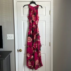 Bright pink floral Maxi dress with slight hi-low hemline and ruffles. Size 8!